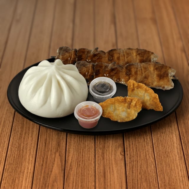 C11 - 1 Siopao, 2 Pieces Dumplings & 2 Sticks BBQ Skewer (Pork or Chicken).